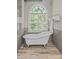 Tranquil bathroom with a clawfoot tub, separate shower, and serene natural light at 3020 Waxhaw Crossing Dr, Waxhaw, NC 28173
