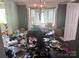 Dining Room with hardwood floors, a window and personal items scattered on the floor at 32891 Nc 49 Hwy, New London, NC 28127