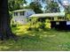 Two story home with a lawn and landscaping that needs some attention at 32891 Nc 49 Hwy, New London, NC 28127