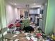 Kitchen with personal items scattered on the floor and a center island at 32891 Nc 49 Hwy, New London, NC 28127