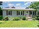This home features a metal roof, nice shutters and a well-manicured front yard at 3425 Long Ferry Rd, Salisbury, NC 28146