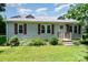 Charming home with a metal roof, dormers, and landscaped front yard at 3425 Long Ferry Rd, Salisbury, NC 28146