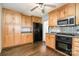 Kitchen featuring ample cabinet space and a stainless steel microwave and oven at 3425 Long Ferry Rd, Salisbury, NC 28146