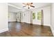 Open-concept living room with hardwood floors and neutral-colored walls at 3425 Long Ferry Rd, Salisbury, NC 28146