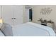 Bedroom with neutral walls, white closet doors, and a plush bed at 402 Wildlife Rd, Troutman, NC 28166