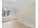 Bright bedroom showcasing a large window offering lots of natural light at 402 Wildlife Rd, Troutman, NC 28166