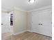 Light-filled bedroom with a contemporary design with an open doorway to another room at 402 Wildlife Rd, Troutman, NC 28166