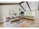 Open dining room with a large table, vaulted ceilings and natural light at 402 Wildlife Rd, Troutman, NC 28166