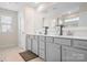 Bright bathroom featuring double sinks and a walk-in shower at 4116 Tory Path Rd, Waxhaw, NC 28173
