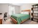 Cozy bedroom featuring a wood frame bed and a view of the yard at 4116 Tory Path Rd, Waxhaw, NC 28173