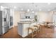 Bright eat-in kitchen features stainless steel appliances, granite countertops, and pendant lighting at 4116 Tory Path Rd, Waxhaw, NC 28173