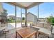 Relaxing screened-in porch perfect for outdoor living and entertaining with comfortable seating at 4116 Tory Path Rd, Waxhaw, NC 28173