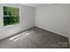 Inviting bedroom with soft carpet and verdant views from the generously sized window at 424 Mallard Dr, Pineville, NC 28134