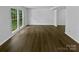 Open living space with ample light, modern flooring and newly painted walls at 424 Mallard Dr, Pineville, NC 28134