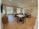 The dining area is light and bright with modern tables and chairs at 4495 Splash Trl # 208, Sherrills Ford, NC 28673