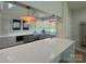 Bright kitchen with quartz countertops, modern appliances, stylish lighting, and ample counter space at 4495 Splash Trl # 208, Sherrills Ford, NC 28673