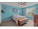 Comfortable bedroom with natural light and neutral decor at 5221 Javitz Rd, Charlotte, NC 28216