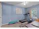 Versatile spare bedroom with exercise equipment at 5221 Javitz Rd, Charlotte, NC 28216