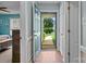 Foyer features hardwood floors and views into the bedroom and front yard at 5221 Javitz Rd, Charlotte, NC 28216