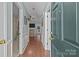 Bright foyer with hardwood floors leads to an open-concept living space at 5221 Javitz Rd, Charlotte, NC 28216