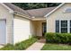Home's entrance features well-kept landscaping and easy access from the driveway at 5221 Javitz Rd, Charlotte, NC 28216