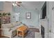 Comfortable living room with fireplace, hardwood floors and a cozy atmosphere at 5221 Javitz Rd, Charlotte, NC 28216