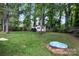 Backyard shed in a landscaped yard at 5221 Javitz Rd, Charlotte, NC 28216