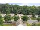 Street view of the neighborhood showcasing the well-maintained homes, mature trees, and tranquil community setting at 5221 Javitz Rd, Charlotte, NC 28216