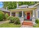Charming two-story home featuring a welcoming front porch and a vibrant red front door at 524 W Horah St, Salisbury, NC 28144