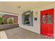 Inviting front porch view featuring a vibrant red front door and cozy outdoor space at 524 W Horah St, Salisbury, NC 28144