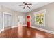 Open living room with hardwood floors, neutral walls, and a view of the front porch through the window at 524 W Horah St, Salisbury, NC 28144