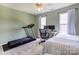 Bedroom featuring a desk, treadmill and a neutral color scheme at 5610 Monticello Nw Dr, Concord, NC 28027
