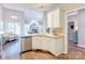 Beautiful kitchen with granite countertops, stainless steel appliances, and hardwood floors at 5610 Monticello Nw Dr, Concord, NC 28027