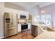 Well-lit kitchen featuring stainless steel appliances, granite counters and an open design at 5610 Monticello Nw Dr, Concord, NC 28027