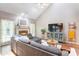 Spacious living room with vaulted ceiling, fireplace, and comfortable seating area at 5610 Monticello Nw Dr, Concord, NC 28027