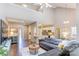 Bright, open living room featuring hardwood floors, soaring ceilings, and comfortable modern furnishings at 5610 Monticello Nw Dr, Concord, NC 28027