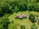 Aerial view of home with a large yard, surrounded by tall trees and providing a sense of privacy at 5635 Highway 55 E Hwy, Clover, SC 29710