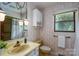 Bathroom with vintage wallpaper, yellow countertops and toilet, and a shower/tub combo at 5635 Highway 55 E Hwy, Clover, SC 29710