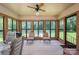 Bright sunroom with lots of windows, natural light, and neutral tones at 5635 Highway 55 E Hwy, Clover, SC 29710