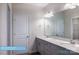 Bright bathroom featuring double sinks, modern fixtures, and a large mirror at 608 Banter Ln # 31, Cramerton, NC 28032