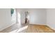 Sunlit bedroom with wood floors and a window at 608 Banter Ln # 31, Cramerton, NC 28032