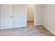 Cozy bedroom with neutral walls, carpet, closet, and natural lighting at 608 Banter Ln # 31, Cramerton, NC 28032
