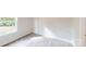 Well-lit bedroom with neutral walls and carpet, featuring a window with outdoor views at 608 Banter Ln # 31, Cramerton, NC 28032