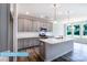 Bright kitchen featuring white countertops, stainless steel appliances, and a kitchen island at 608 Banter Ln # 31, Cramerton, NC 28032