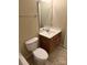 Cozy bathroom with a neutral vanity, a large mirror, toilet, and tile floor, designed for comfort at 6130 Sid Crane Dr, Charlotte, NC 28216