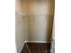 Functional closet featuring standard shelving and neutral carpeting for storage at 6130 Sid Crane Dr, Charlotte, NC 28216