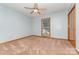 Bright bedroom with a window, neutral walls, and plush carpet for a cozy atmosphere at 614 W Peeler St, Salisbury, NC 28146