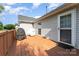 Outdoor wooden deck perfect for relaxing or entertaining, with direct access to the house at 614 W Peeler St, Salisbury, NC 28146