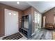 Welcoming entryway with a functional hall tree, stylish flooring, and ample natural light at 6811 Ledgestone Pl, Charlotte, NC 28227
