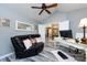 Stylish office space with vaulted ceiling, modern decor, gray plank floors, and plenty of natural light at 6811 Ledgestone Pl, Charlotte, NC 28227